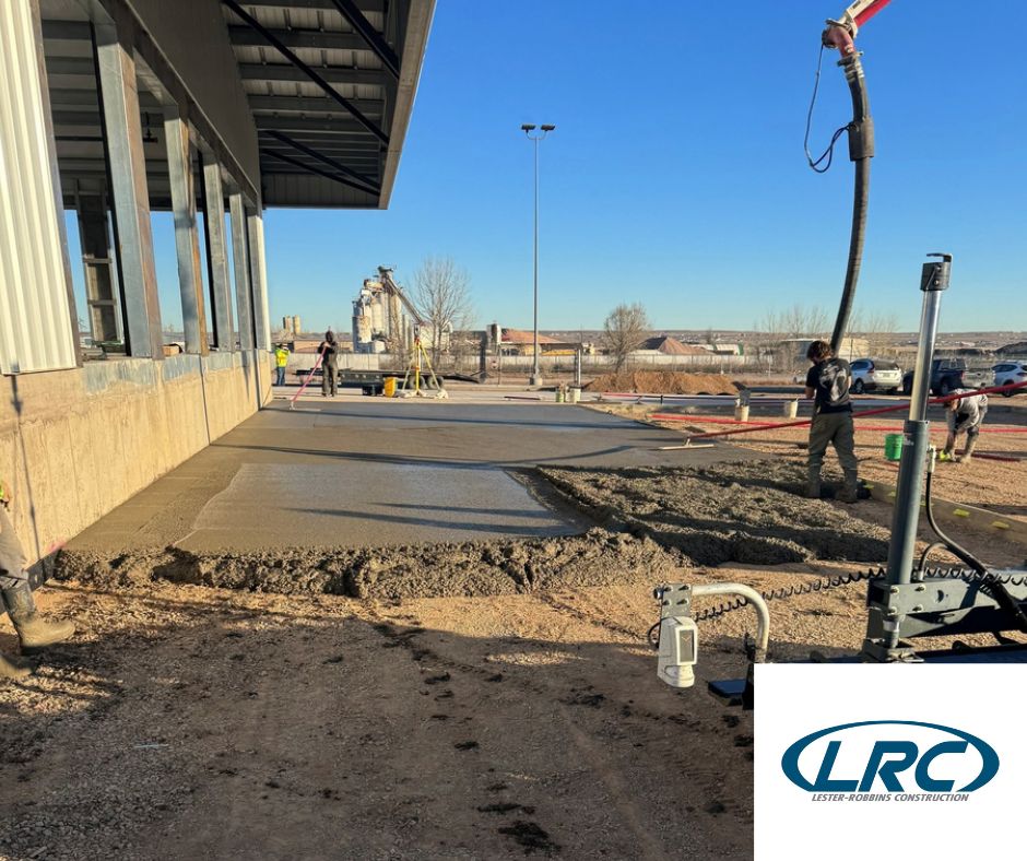Image of Lester-Robbins Construction crew laying down foundation.